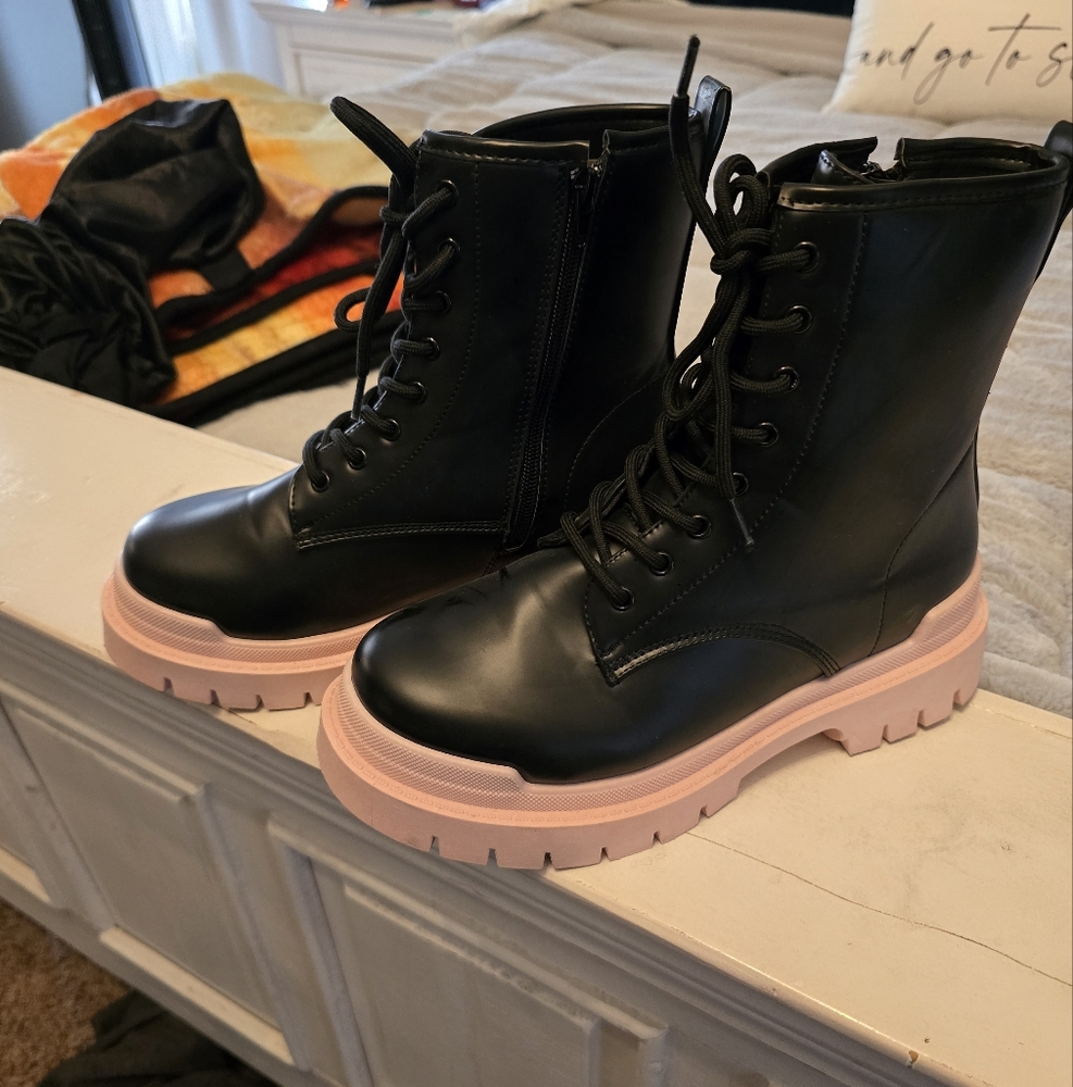 Black and pink combat boots